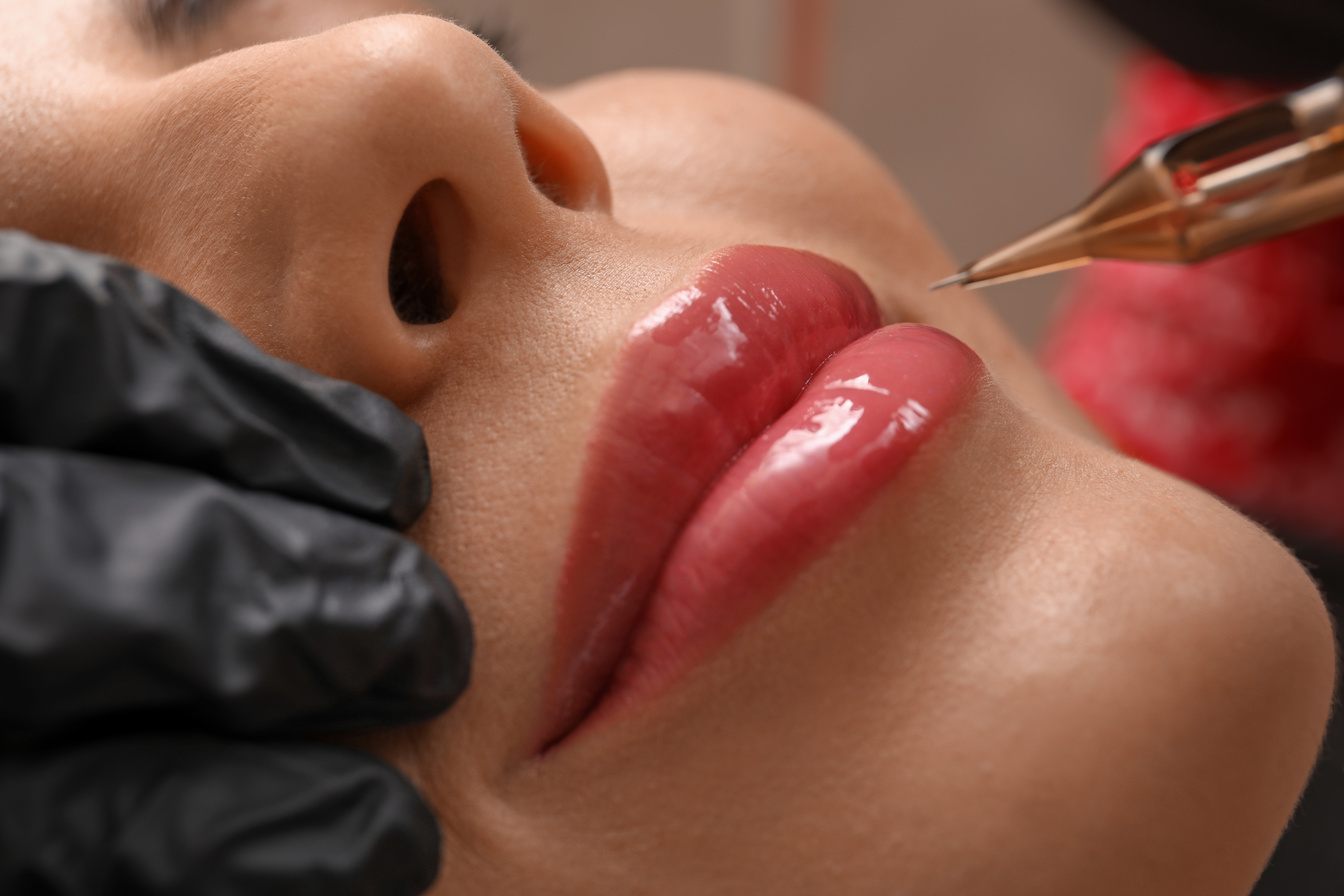 Young Woman Undergoing Procedure of Permanent Lip Makeup in Tatt